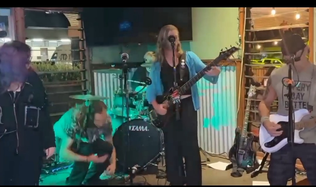 Subject to Change performing in a live Facebook video